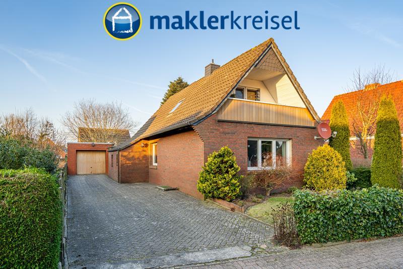 Esens: Solides Haus in begehrter Lage mit Wintergarten, Loggia und Garage!