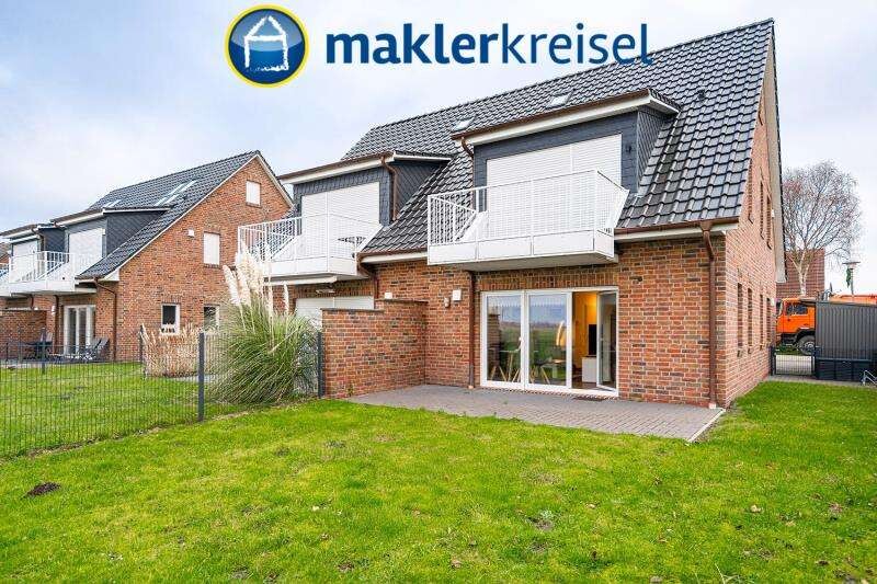 Modern wohnen am Meer – Erdgeschosswohnung mit Garten & Weitblick in Neßmersiel