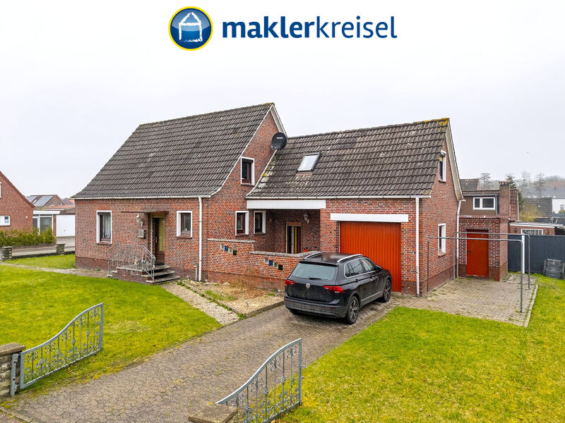 Solides Siedlungshaus mit Garage und Werkstatt in ruhiger Wohnlage!