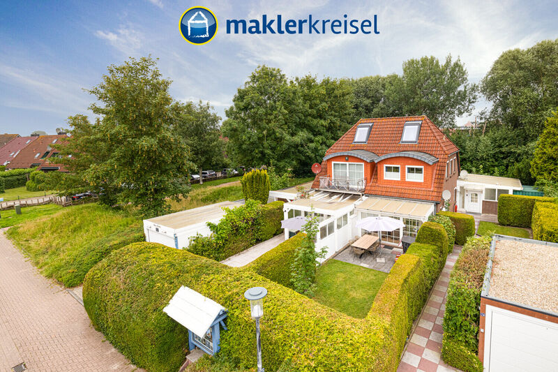 Nordseeheilbad Carolinensiel: Doppel-Ferienhaus mit Wellnessbereich und Wintergarten in Top-Lage!